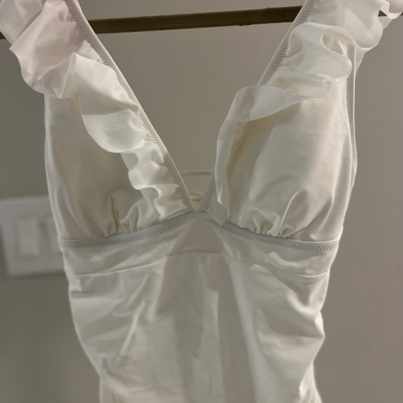 New white one piece bathing suit. - Picture 5 of 8